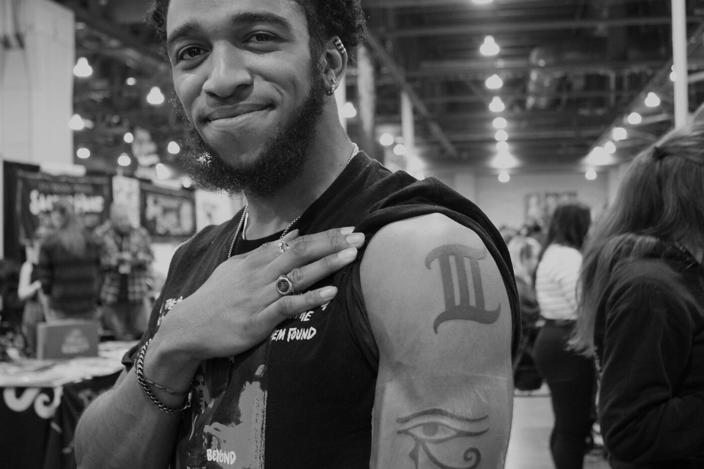 A traveler showing his Gemini tattoo